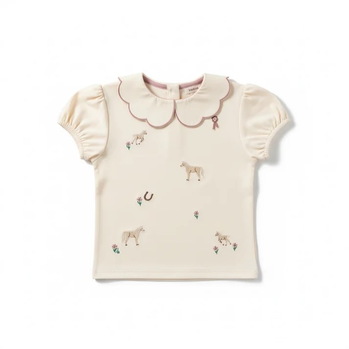 The Embroidered Pony Puff Sleeve Top